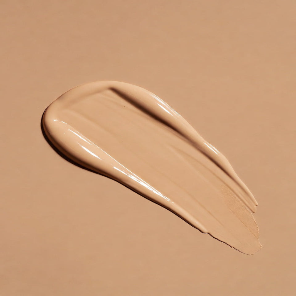 ENLUSY N‑220 Neutral Beige Glow foundation swatch — balanced medium neutral beige shade, calibrated for South Asian skin realism with a natural satin glow.